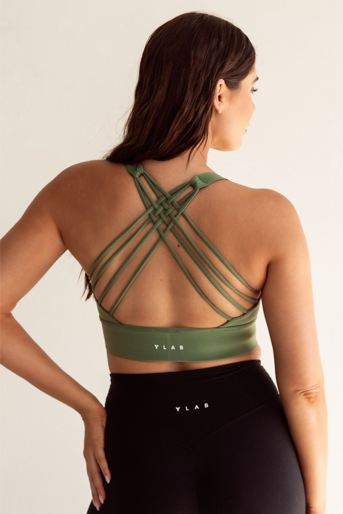 Model wearing Pure Elevation Sports Bra in Basil