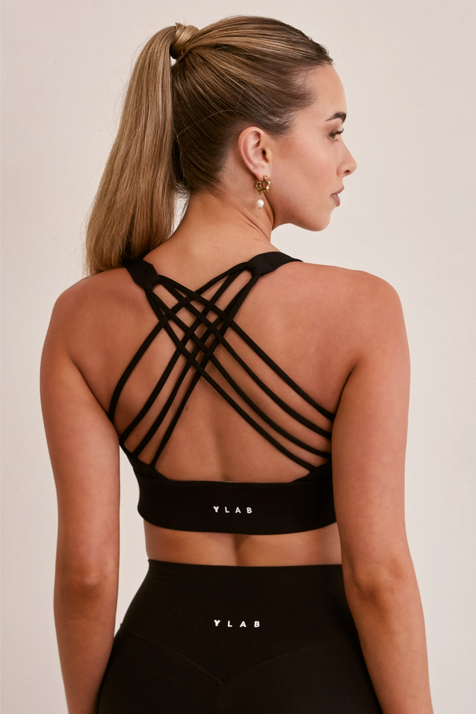 Model wearing Pure Elevation Sports Bra in Black