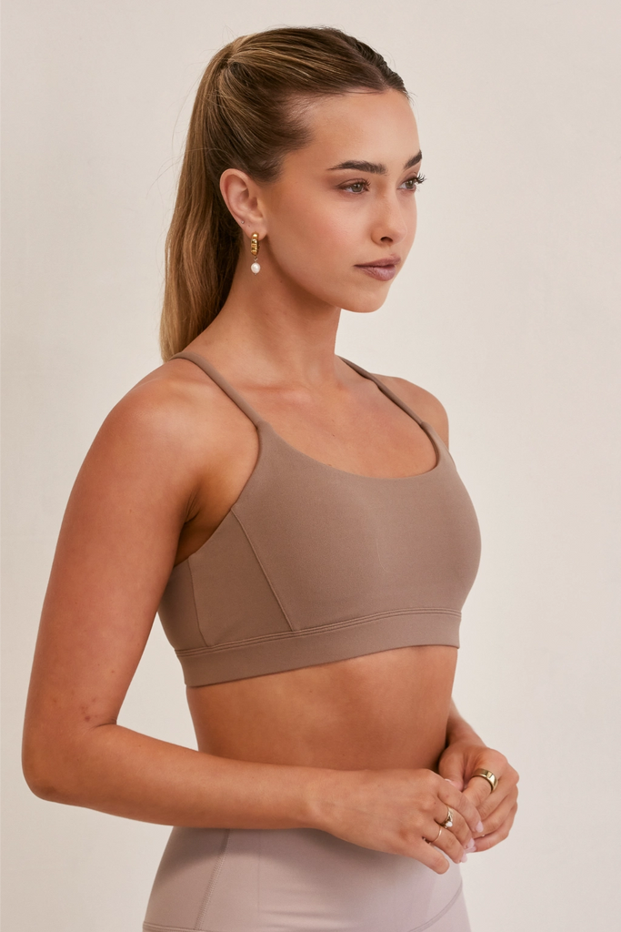 Model wearing Soft Basics Sports Bra in Latte