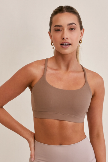 Model wearing Soft Basics Sports Bra in Latte